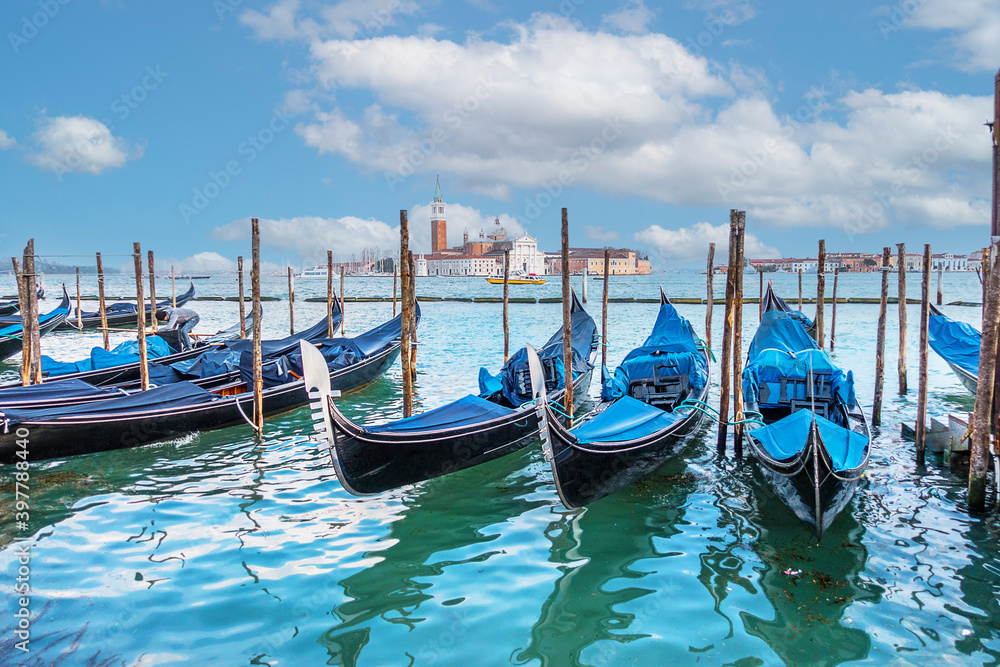 Looking across the Venice lagoon with Gondolas and the Church of San Giorgio Maggiore