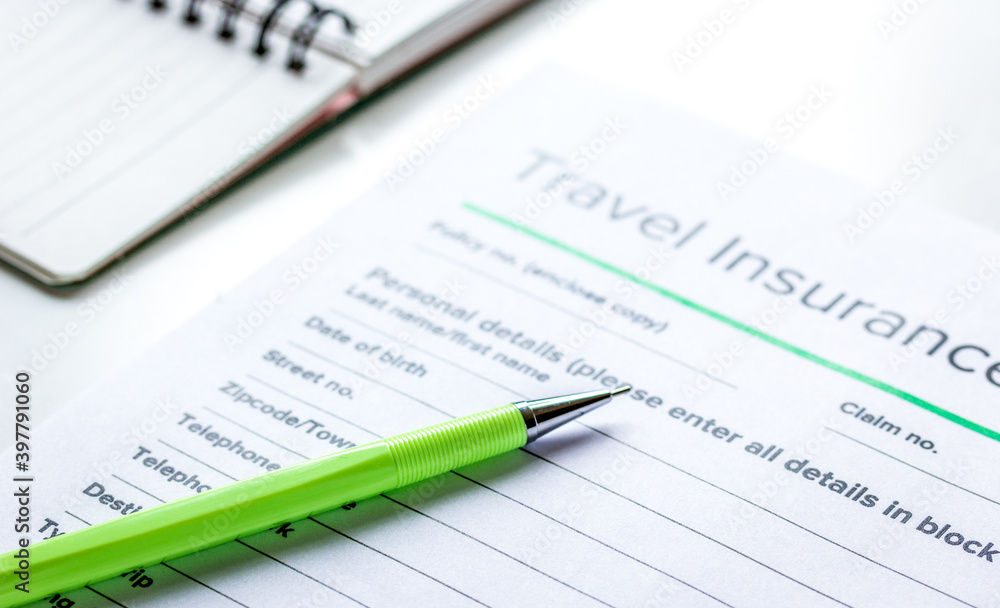 booking travel concept with insurance on table background