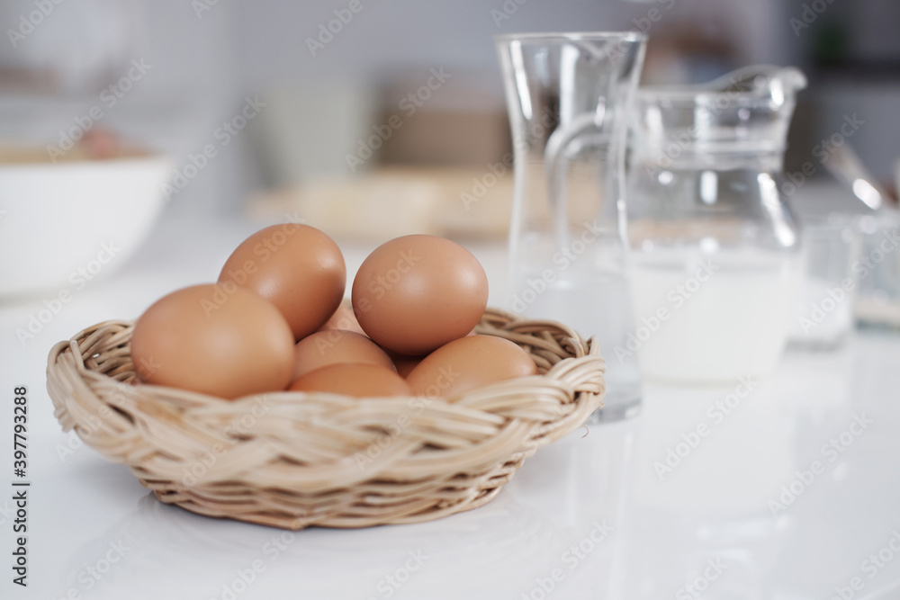Fresh eggs in basket is ingredient for baking cake and bakery homemade. Fresh eggs in basket is ingredient for baking cake and bakery homemade.