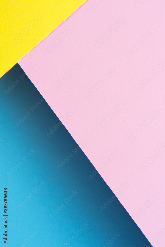 Abstraction from multicolored paper backgrounds with contrasting shadows