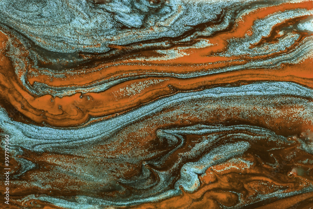 
Abstract texture of mixing colors similar to marble stone in brown-blue tones.