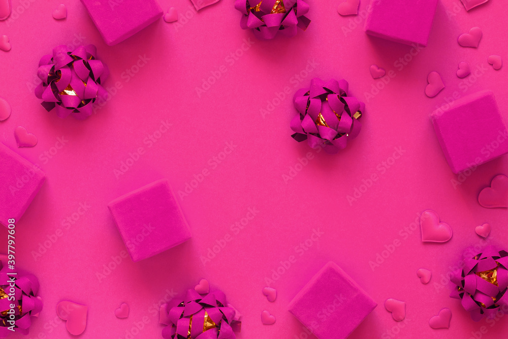 Pink gift boxes on a festive background.Tradition to congratulate on a holiday.