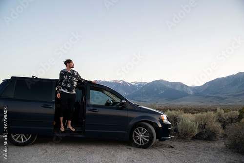 young man living in his van in the mountains