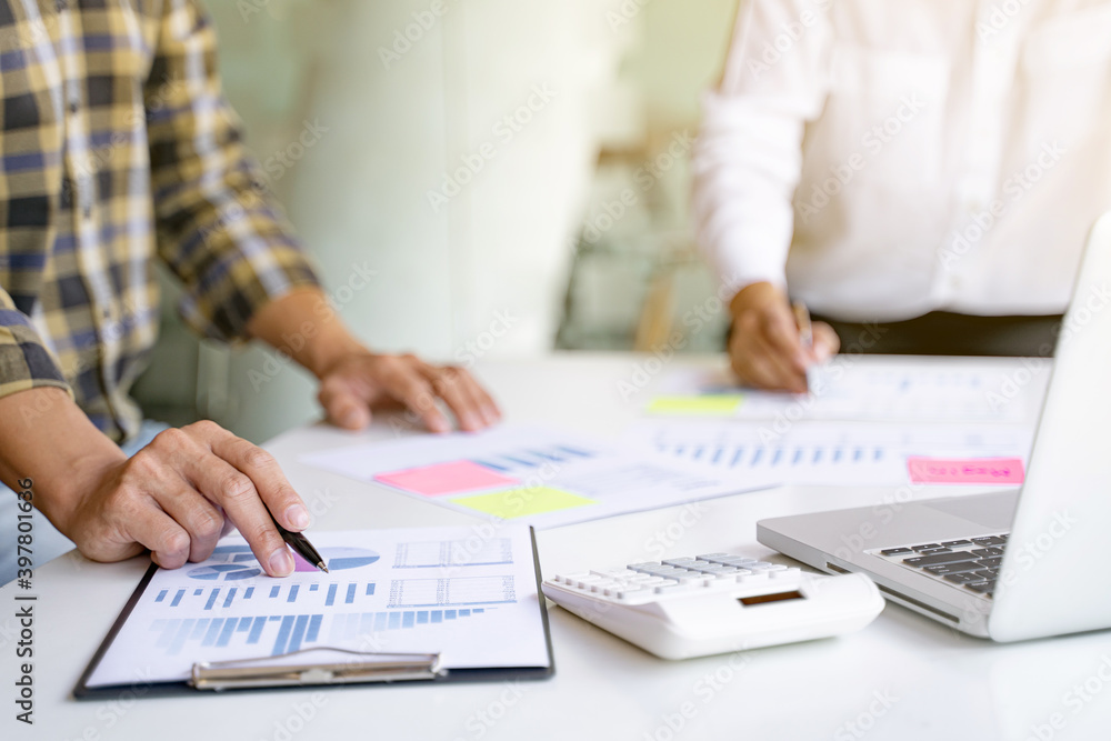 Financial inspector calculating a numbers in office room.. Financial inspector calculating a numbers in office room..