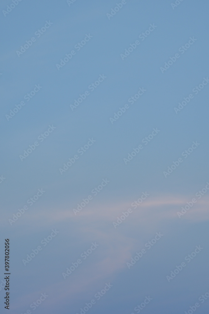 Golden hour Nature background with sky and clouds in vertical frame
