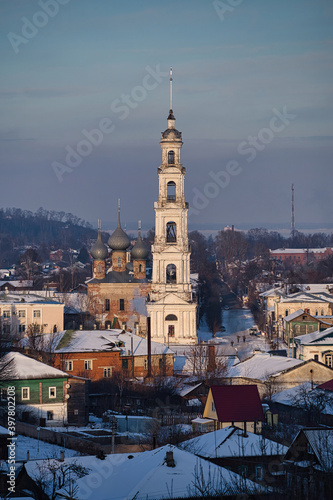 Old Russian city in winter. City of Yurievets in winter. Winter sleep. Snow-white bell tower of the city. Panorama of the old city. photo