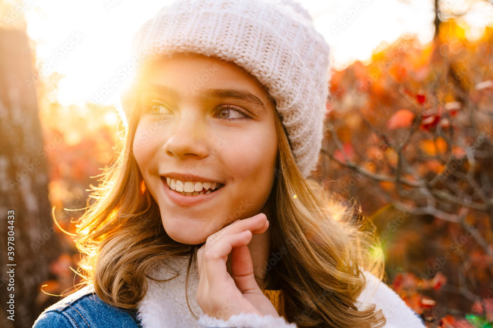 Close up portrait of a young girl in warm hat Close up portrait of a young girl in warm hat