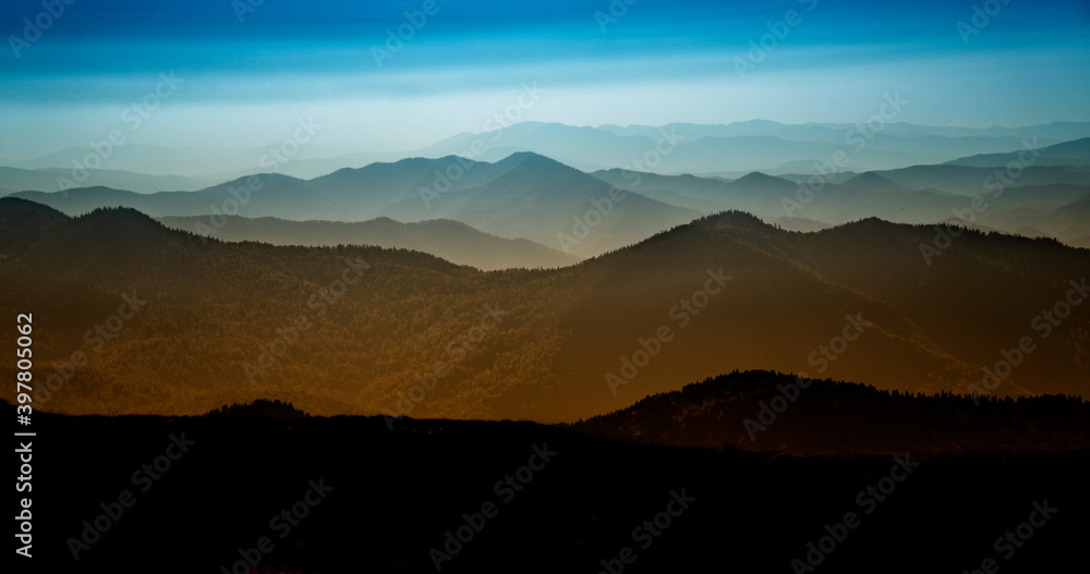 Sunset on the mountain silhouette mountains