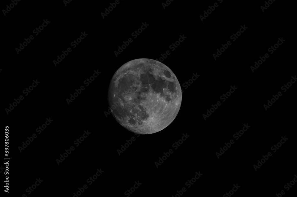 full moon in the dark sky, black and white photo full moon in the dark sky, black and white photo