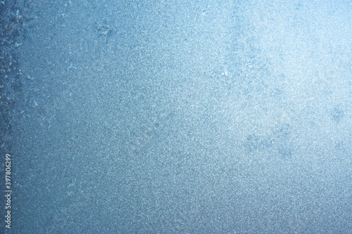 Winter frozen background, beautiful texture of frozen glass in winter, negative air temperature