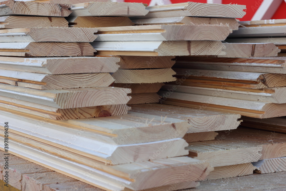 Building boards painted with white paint stacked Building boards painted with white paint stacked