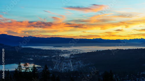 Sunrise over Fraser Valley and city of Port Moody, BC