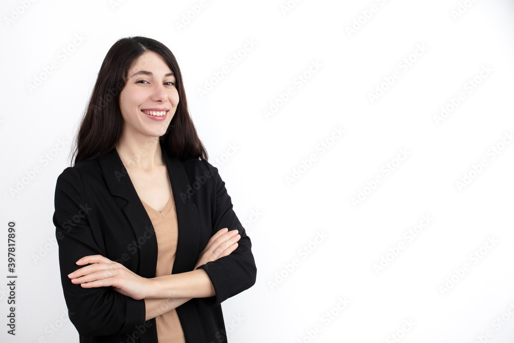 Smiling confident business woman posing with folded arms. Happy business woman in formal suit standing for camera on white studio background. Corporate portrait concept.
Smiling confident business woman posing with folded arms. Happy business woman in formal suit standing for camera on white studio background. Corporate portrait concept.