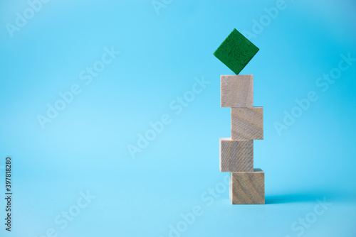 wooden cube stacking as stair step shape  mock up for create symbol or logo  business growth and management concept