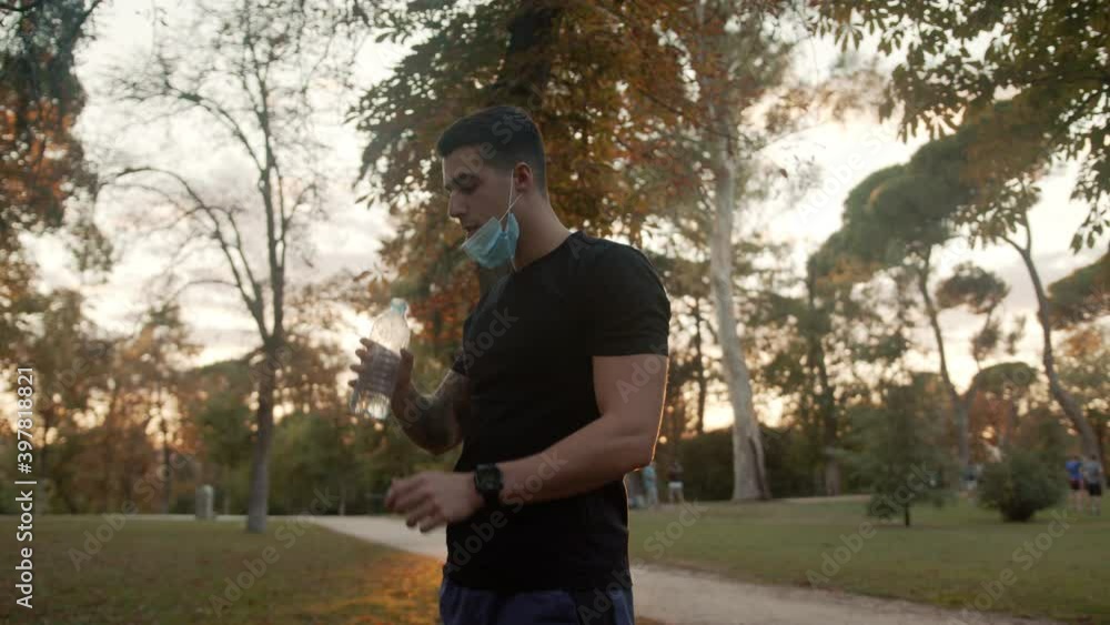 Man Exercising with Facemask Outdoors Man Exercising with Facemask Outdoors