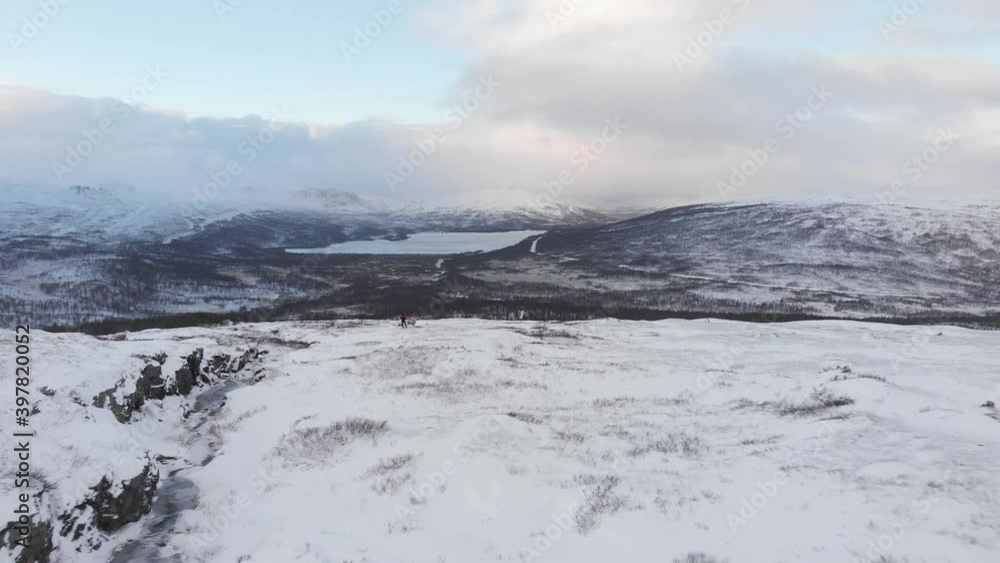 Frozen rocky landscape on Hemavan Tärnaby in the north of Sweden - Low angle Fly-over aerial Frozen rocky landscape on Hemavan Tärnaby in the north of Sweden - Low angle Fly-over aerial