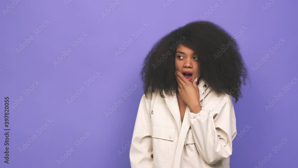 Young african american curly woman happy, smiling and cheerful Young african american curly woman happy, smiling and cheerful