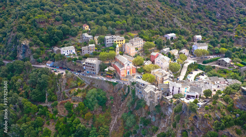 The medieval village of Nonza in Cap Corse is perched on a 100 meter high vertical cliff overlooking the mediterranean Sea. Corsica France