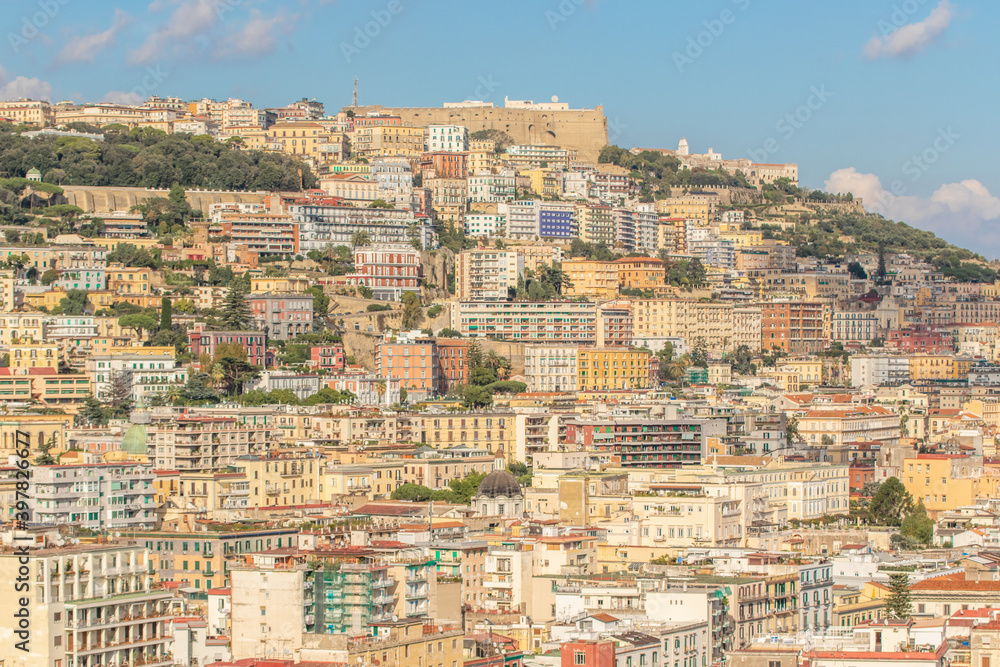 Naples, Italy - heavily bombed during World War II, Naples has seen a savage urbanization in the 60s. Here in particular the wild and colorful skyline 