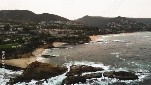 Flying over the sea at Laguna Beach at afternoon photo