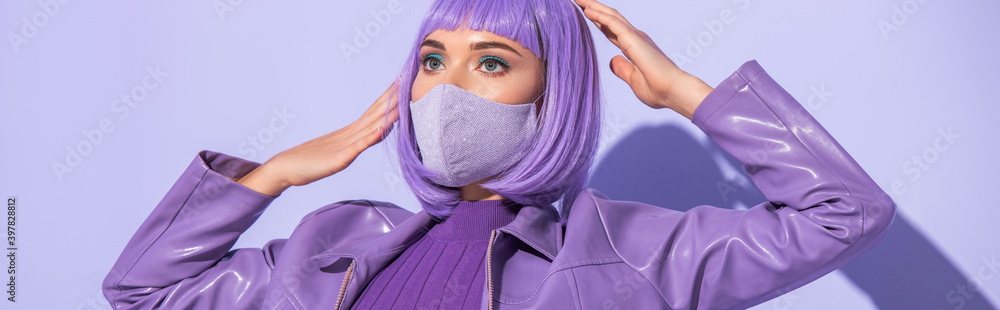 young woman dressed in doll style in medical mask on violet colorful background, banner young woman dressed in doll style in medical mask on violet colorful background, banner