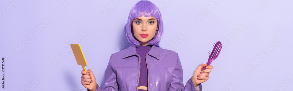 young woman dressed in doll style with hair brush and mirror on violet colorful background, banner young woman dressed in doll style with hair brush and mirror on violet colorful background, banner