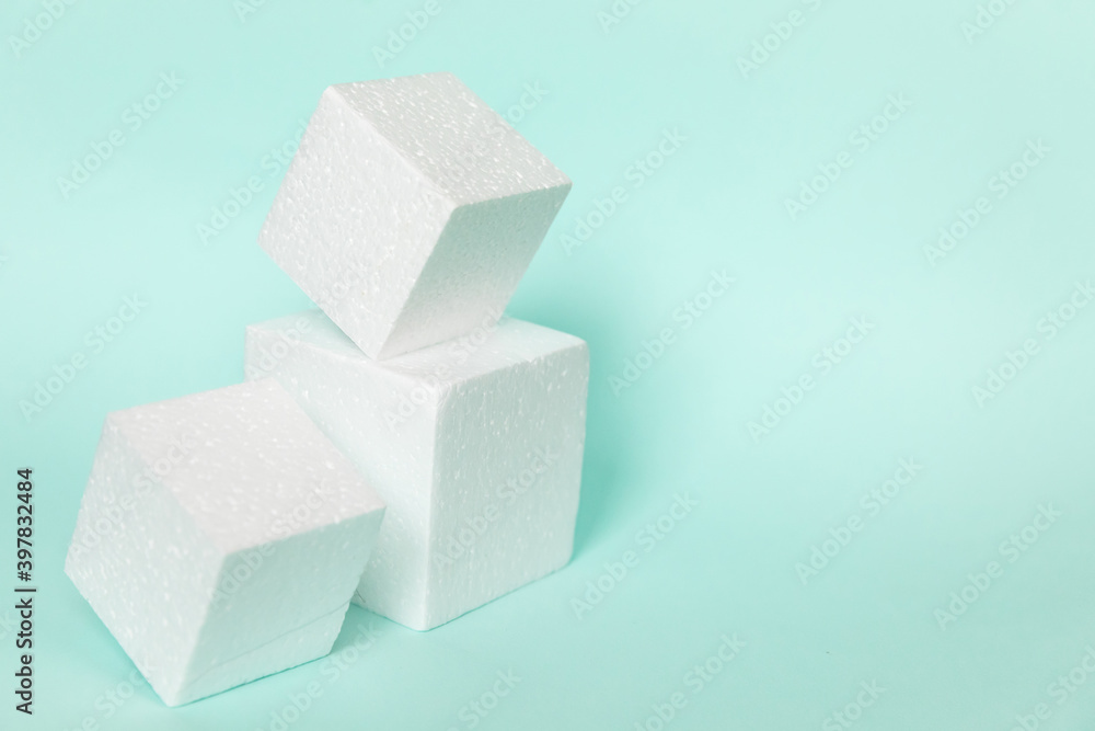 White rectangular cube shapes on blue background. Minimal boxes geometric forms podium. Empty unbranded shopfront. Showcase for cosmetic product. Mockup style design. Cosmetology and beauty concept. White rectangular cube shapes on blue background. Minimal boxes geometric forms podium. Empty unbranded shopfront. Showcase for cosmetic product. Mockup style design. Cosmetology and beauty concept.