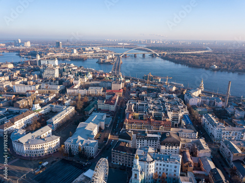 Aerial drone view. Streets of the historical center of Kiev - Podil on a sunny morning.