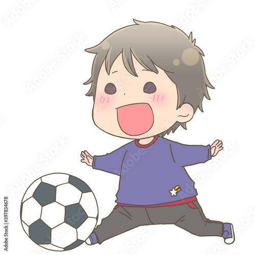 サッカーボールを蹴る男の子