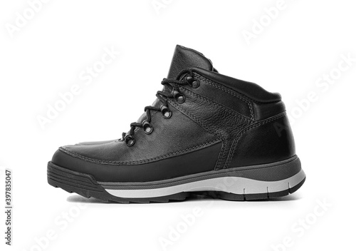 Black winter boots isolated on white background.