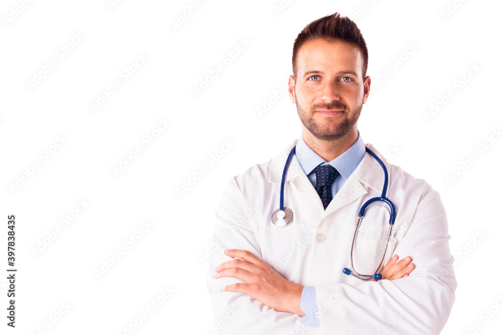 Studio shot of smiling male doctor standing at isolated white background