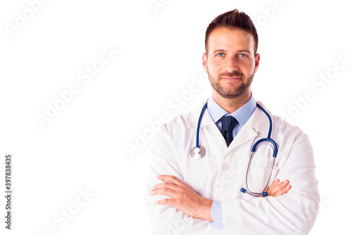 Studio shot of smiling male doctor standing at isolated white background © sepy