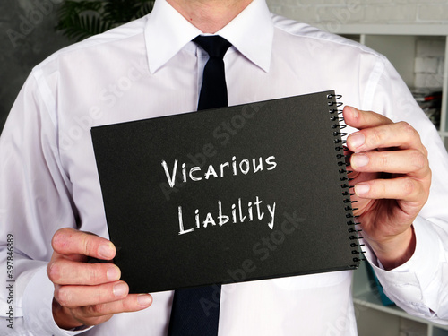Business concept meaning Vicarious Liability with sign on the sheet. photo