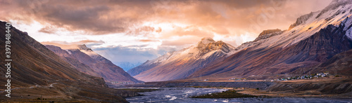 Serene Landscape of Spiti river valley   snow capped mountains during sunrise near Kaza town in Lahaul   Spiti district of Himachal Pradesh  India.