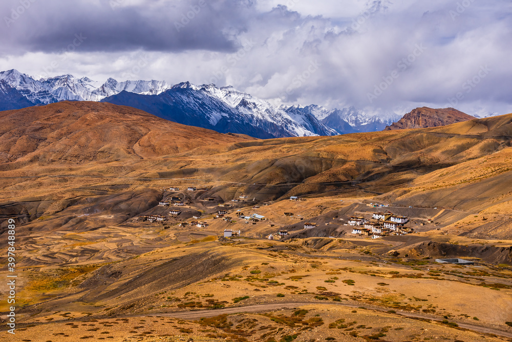 Fototapeta premium Bird eye aerial view of Hikkim village, famous for highest Post office of the world located in the cold desert valley of Spiti at elevation of 4400m in the Himalayas of Himachal Pradesh, India.