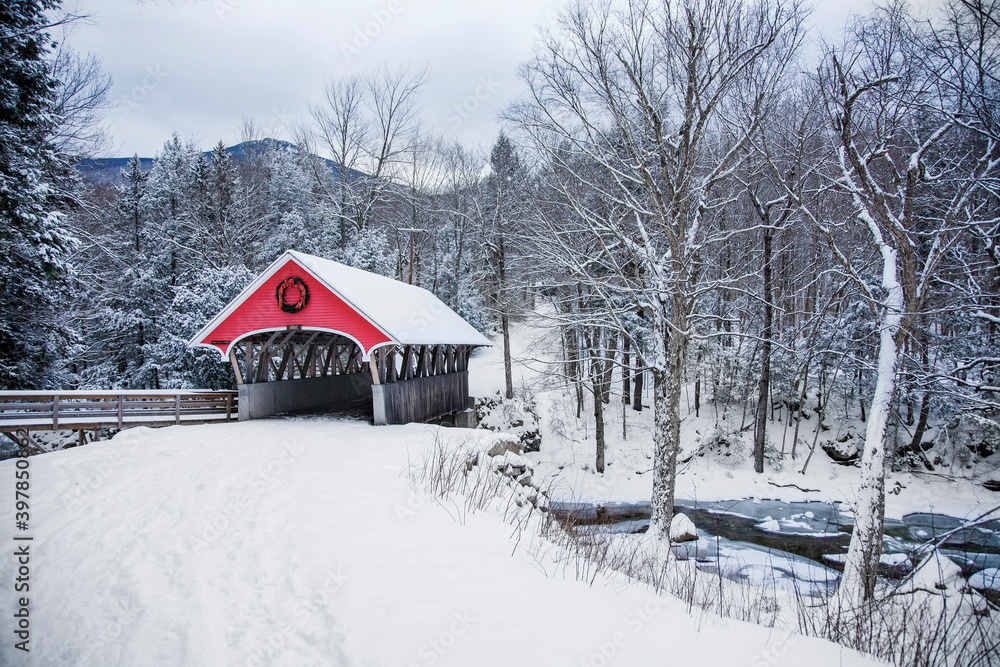 Covered bridge snowfall in rural New Hampshire
