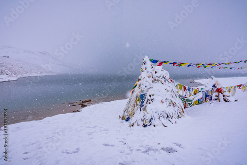 Snowy Chandratal or Lake of the moon is a high altitude lake located at 4300m in Himalayas of Spiti Valley, Himachal Pradesh, India. The name of Lake originated due to its crescent moon like shape. photo