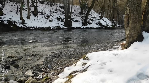 snow on the river photo