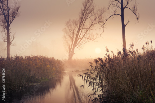 Misty river Ełk in autumn.