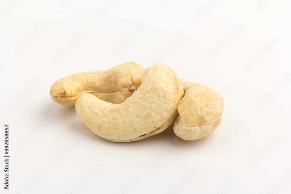 Raw cashew nuts isolated on white background. Raw cashew nuts isolated on white background.