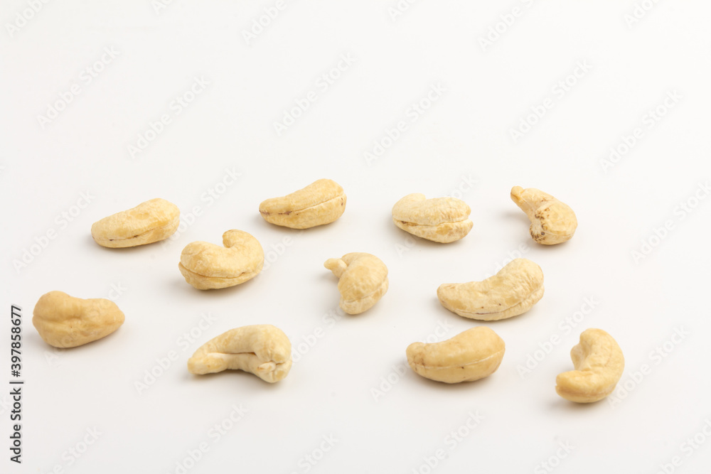 Raw cashew nuts isolated on white background. Raw cashew nuts isolated on white background.