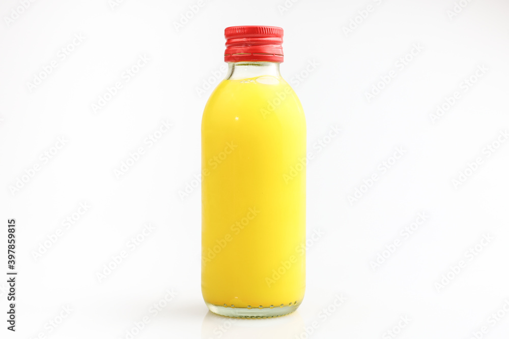 Orange Juice in a Bottle Isolated on White. The concept of beverages, health food and diet. Orange Juice in a Bottle Isolated on White. The concept of beverages, health food and diet.