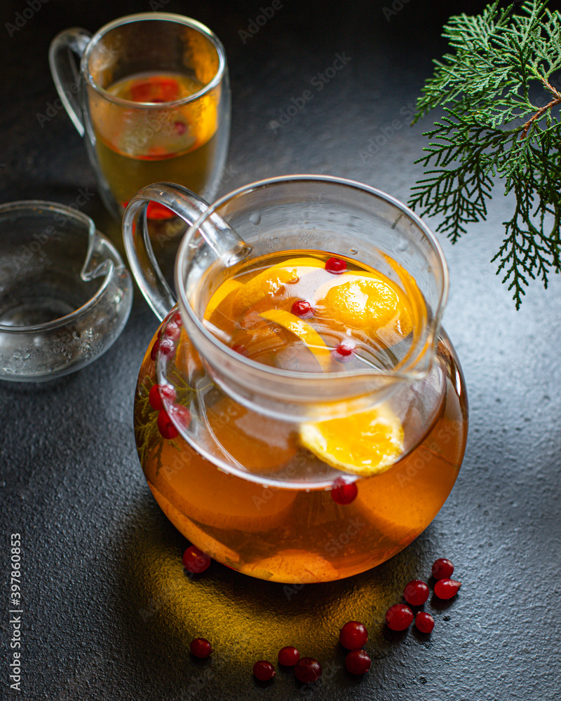 fruit tea teapot fresh fruits and berries citrus hot beverage mint and other warming drink in a kettle on the table healthy top view copy space for text food background rustic fruit tea teapot fresh fruits and berries citrus hot beverage mint and other warming drink in a kettle on the table healthy top view copy space for text food background rustic