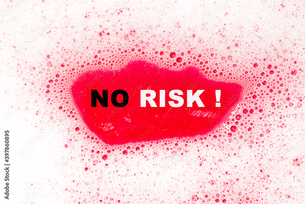 text NO RISK in the background. White soap foam creates a great ...