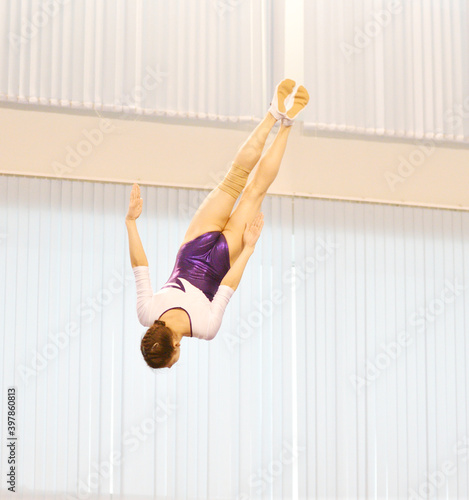 Girls train in trampoline jumping