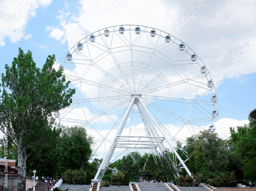  The "One Sky" Ferris Wheel is installed in the Revolution Park. Vacationers strolling along the paths