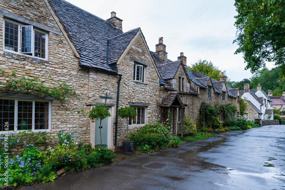 Step back in time and visit Castle Combs, quaint village with well preserved masonry houses dated back to 13 century. Castle Combe, a picturesque medieval village in England. UK.
