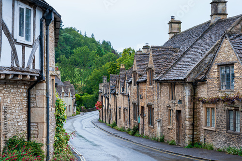Step back in time and visit Castle Combs, quaint village with well preserved masonry houses dated back to 13 century. Castle Combe, a picturesque medieval village in England. UK. © Jakub Rutkiewicz