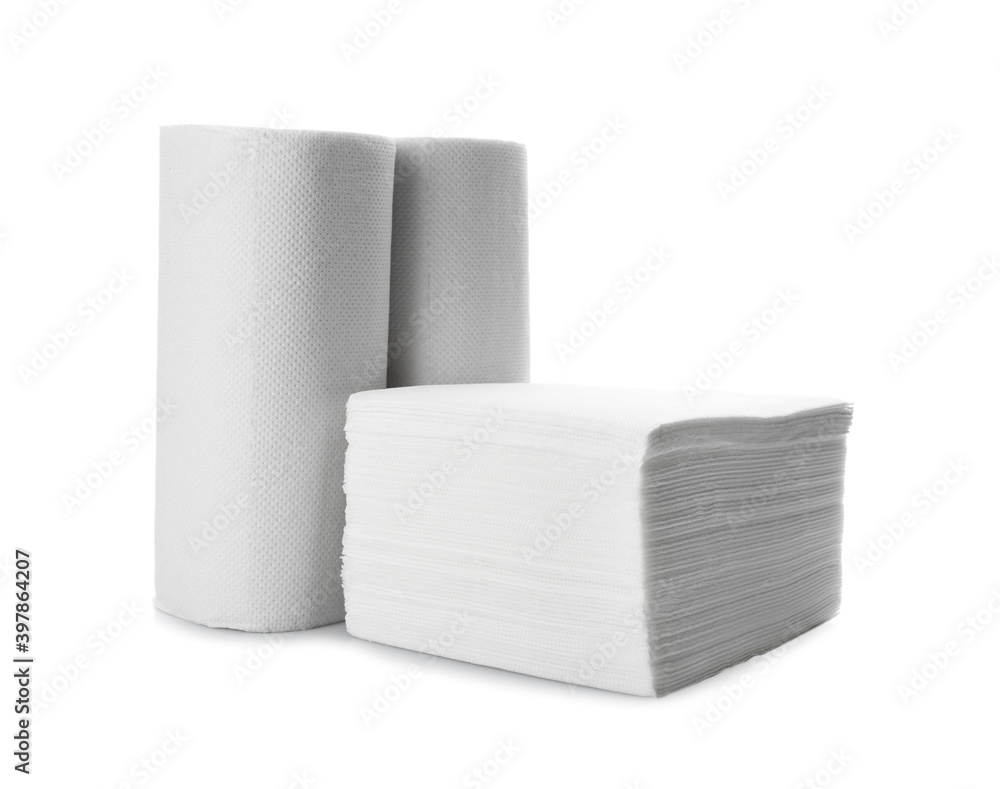 Rolls and stack of clean paper tissues on white background Rolls and stack of clean paper tissues on white background