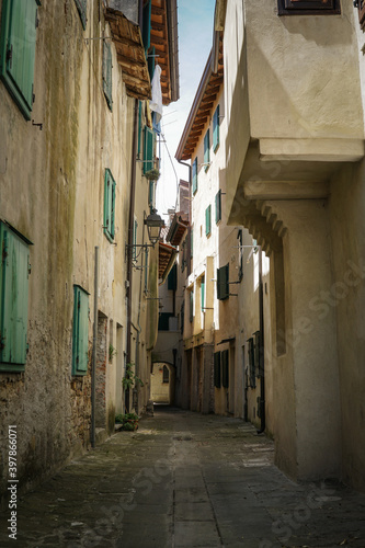Tiny street in seaside town © Erick